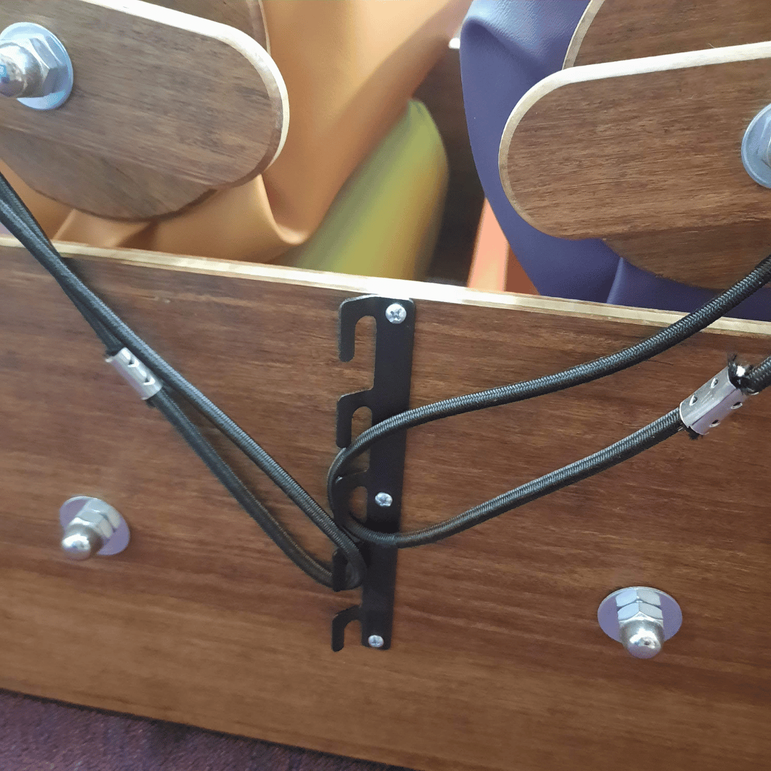Close up of sensory steamroller cord and bracket