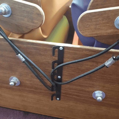 Close up of sensory steamroller cord and bracket