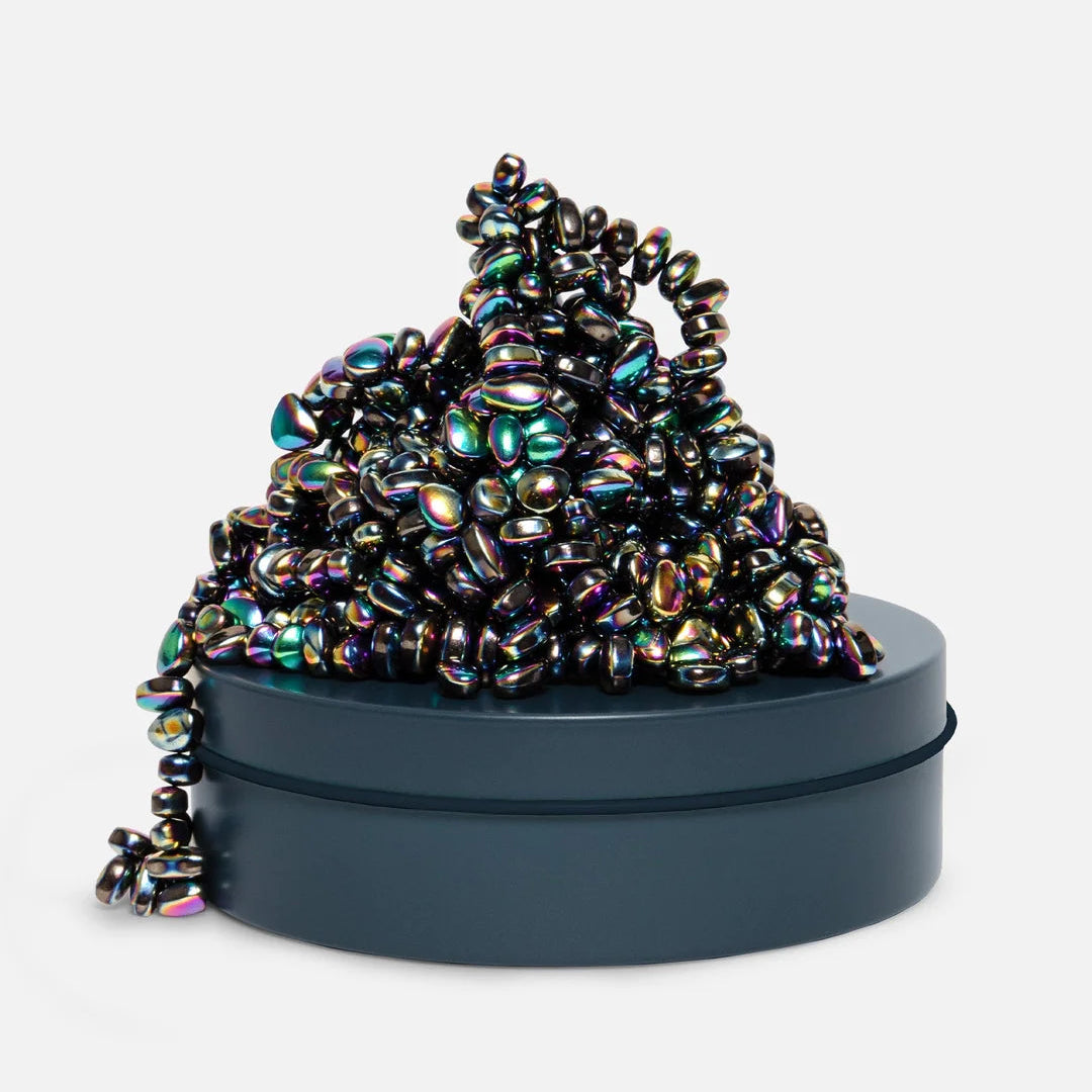 Speks Crags 300 medium tin oil slick on desk