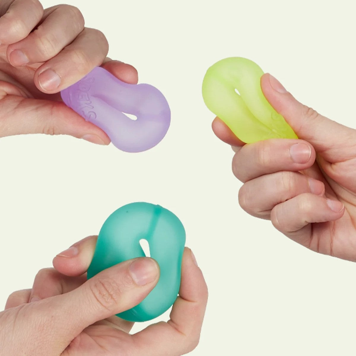 Speks Mini Loop Gumps being squeezed
