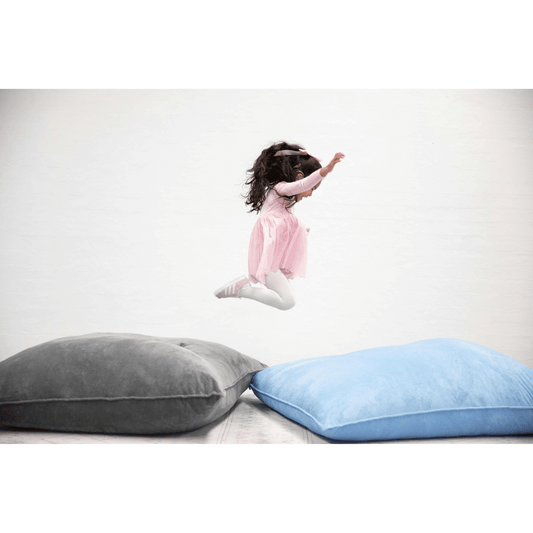 Mooshy Mat Crash Mat Girl Jumping Across mats