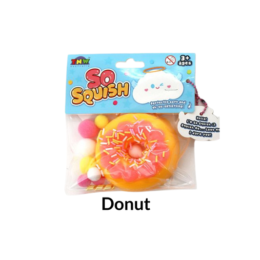 TABA So Squish Donut Squishy with Pink icing and pink, yellow and white pom poms.