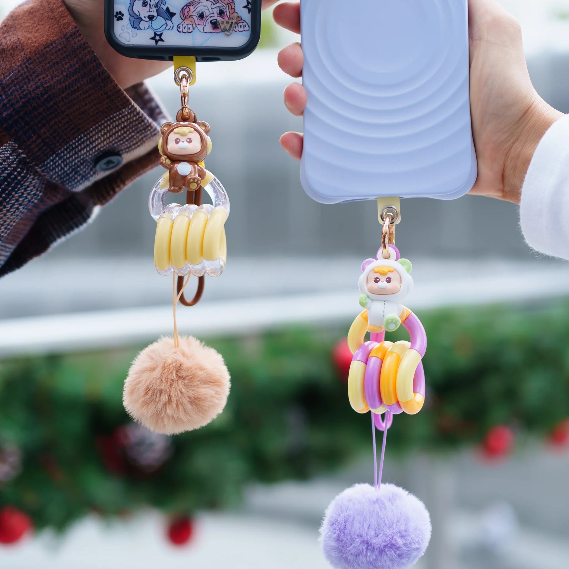 Tangle x Hidden Wooo Abebe Bear hanging from phone