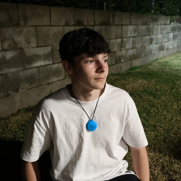 Teen wearing Vibrant Hummingbird Pendant