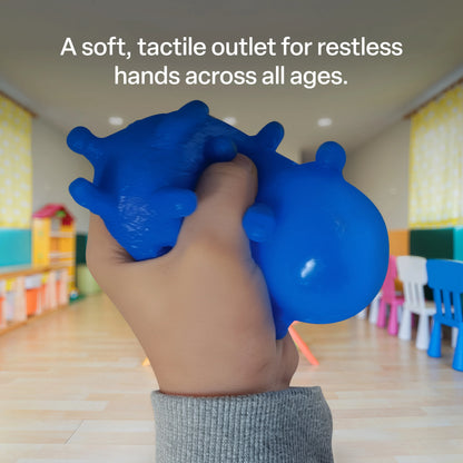 Child holding Puffer Stress Ball 4 Pack