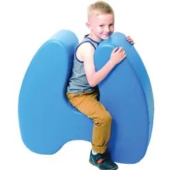 boy sitting on sensory squeezie seat