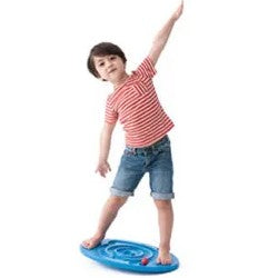 Child standing on Weplay maze balance board