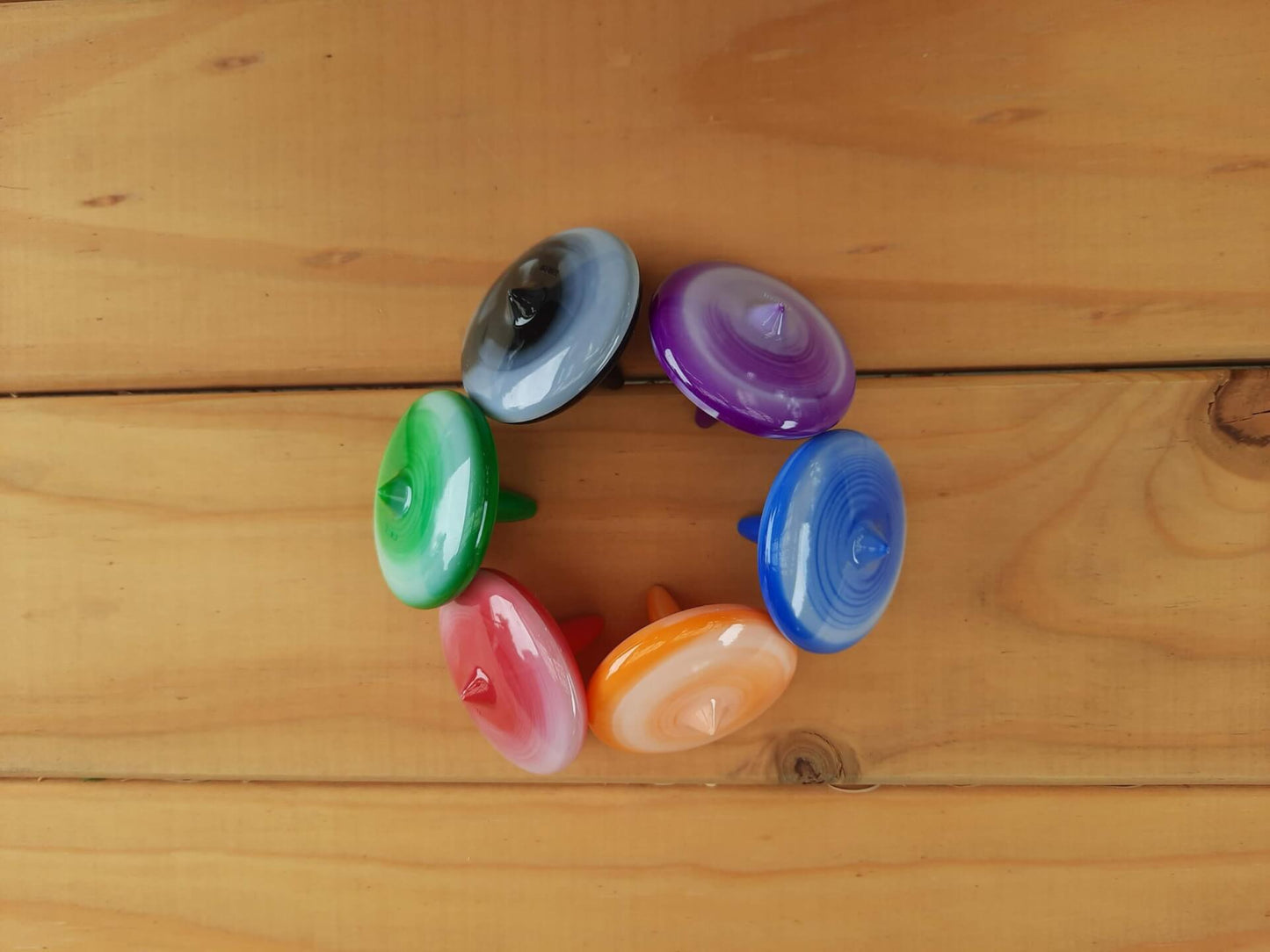 tie dyed spinning tops circle