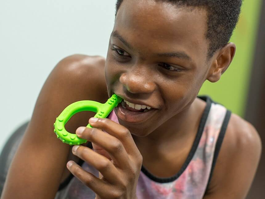 Boy with Ark Therapeutics Textured Grabber