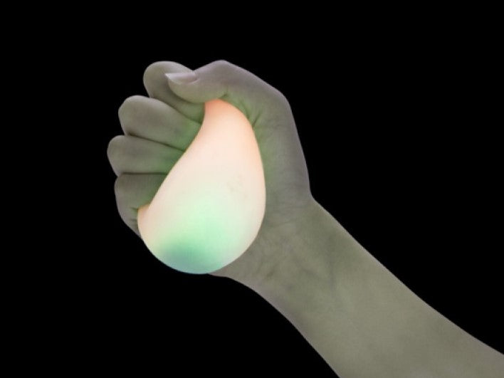 Smoosho glow in the dark ball in hand