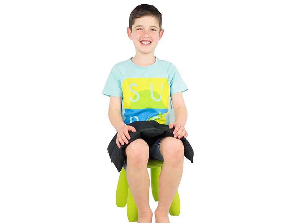 Boy with weighted lap bag pad